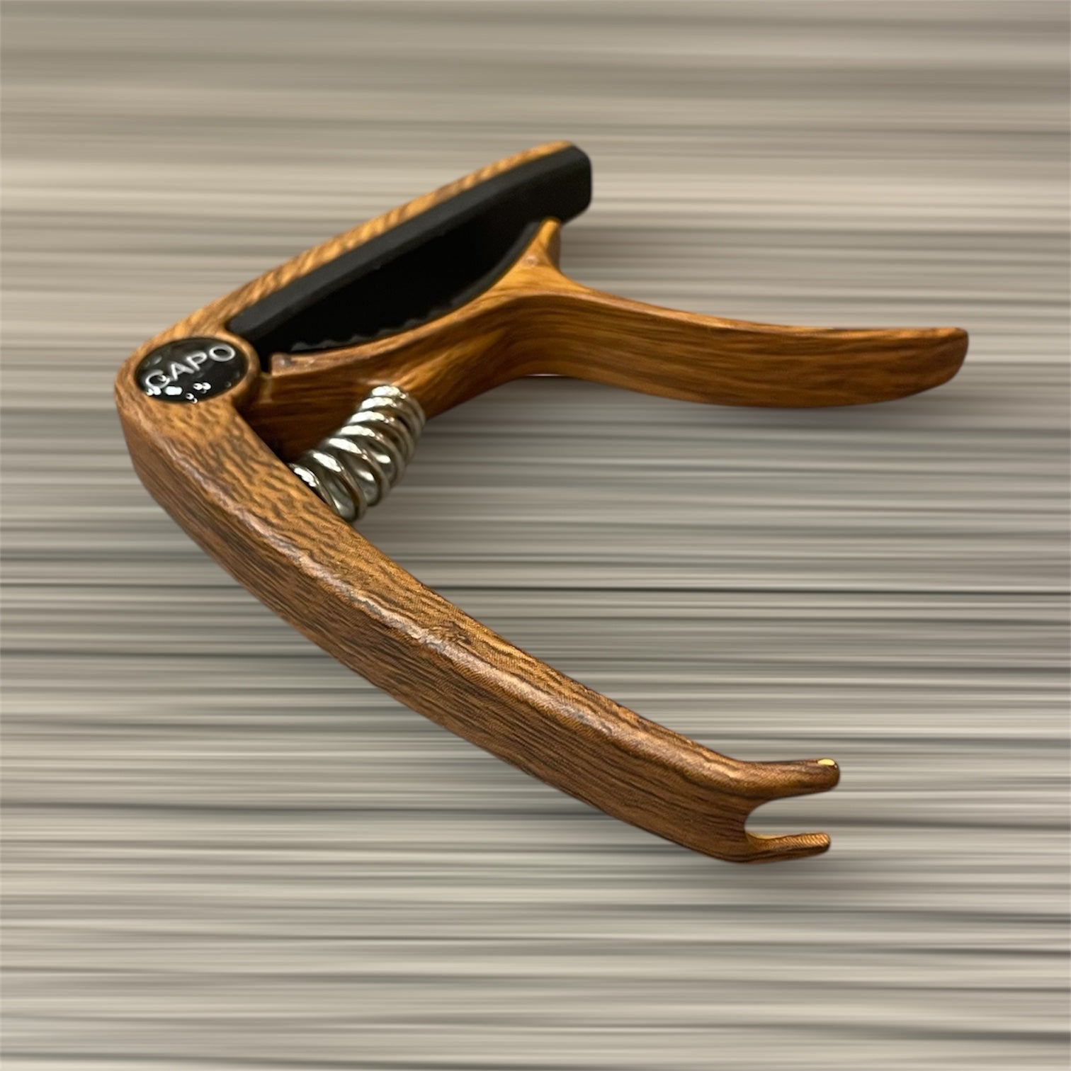 Aluminum Trigger Capo: Dark Wood Grain