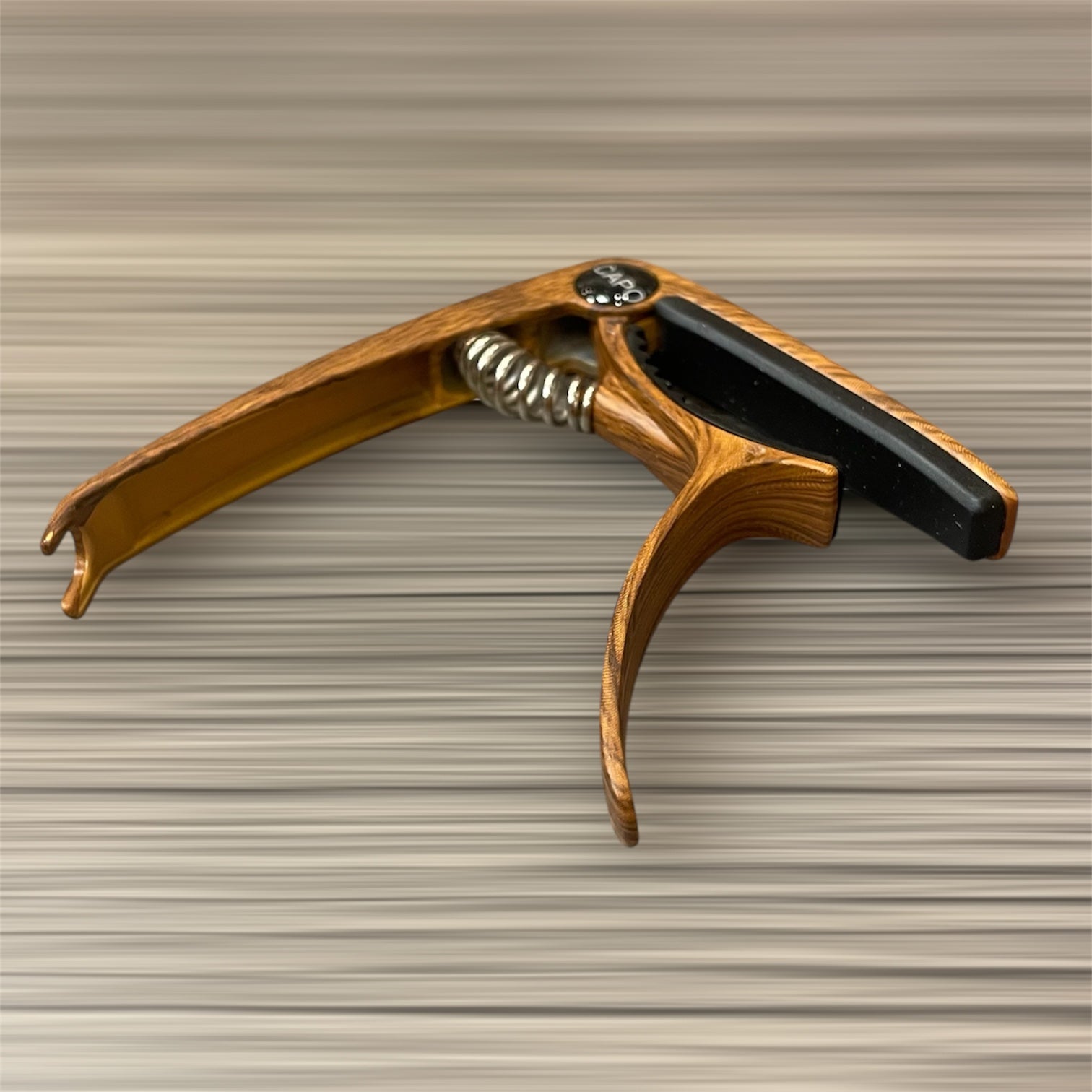Aluminum Trigger Capo: Dark Wood Grain